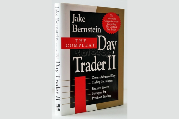 Jack Bernstein’s books displayed with market charts and trading tools